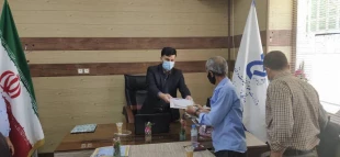 تجلیل از کارکنان ایثار گر و جانباز آموزشکده فنی و حرفه ای  لارستان 4