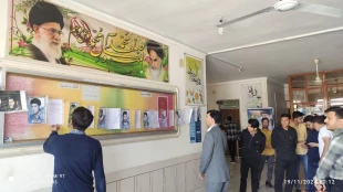 برپایی نمایشگاه عکس شهدا  به مناسبت هفته بسیج در دانشگاه ملی مهارت لارستان 2